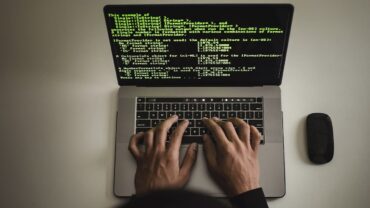 Hands on the laptop